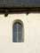 fenêtre avec arc en demi-cercle de Sint-Servatiuskerk (te Groot-Loon)