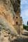 House built against rocks