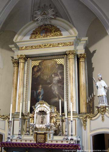 Saint-Nicholas RAEREN / BELGIUM The main altar in baroque style is flanked by 2 statues of Saint Nicholas. 