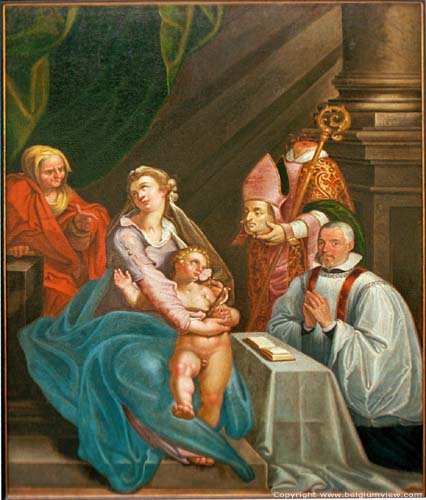 Sint-Amanduskerk van Wezeren WALSHOUTEM / LANDEN foto Een vrij spectaculair schilderij (of moeten wij zeggen luguber) dat een onthoofde dyonisius van Parijs (patroonheilige van de opdrachtgever pastoor Dionysius Collart) uitbeeldt naast de opdrachtgever, Jezus, Maria en haar moeder Anna.  Het dateert van het