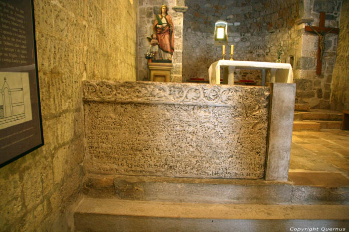 Saint-Lucia's church with Baka stone (in (te Draga Bacanska) Baka / CROATIA 