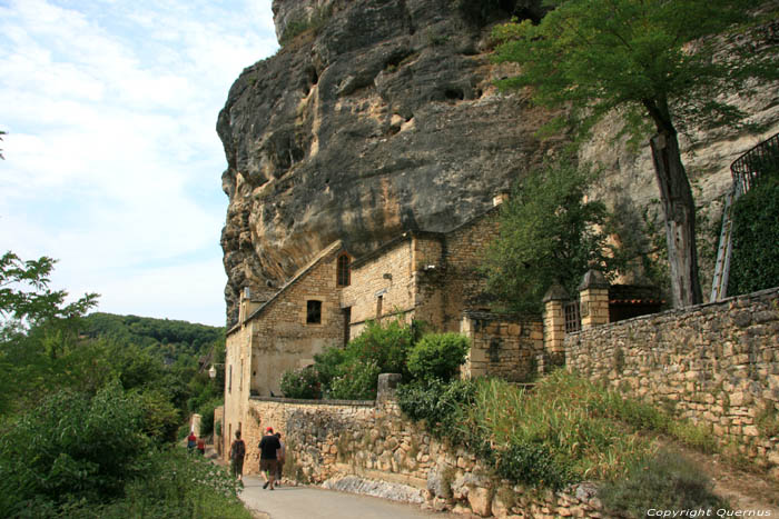 House built against rocks La Roque-Gageac / FRANCE 