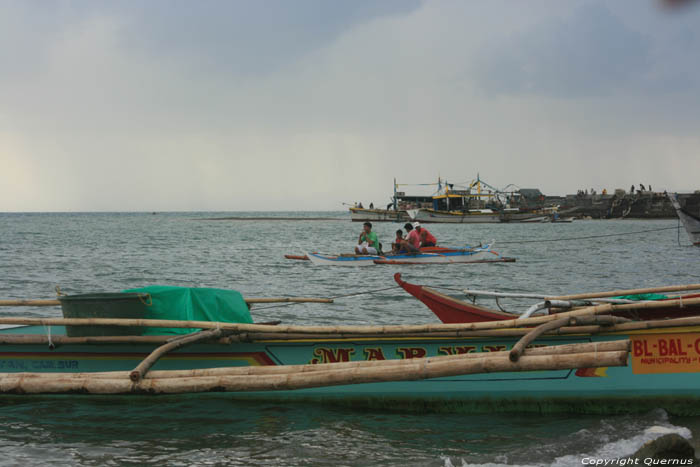 Beach and harbor Balatan / Philippines 