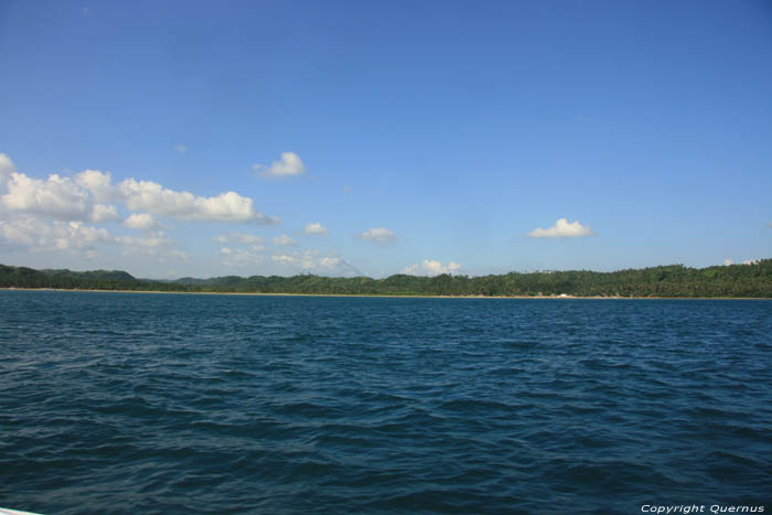 Coast line from sea Donsol / Philippines 