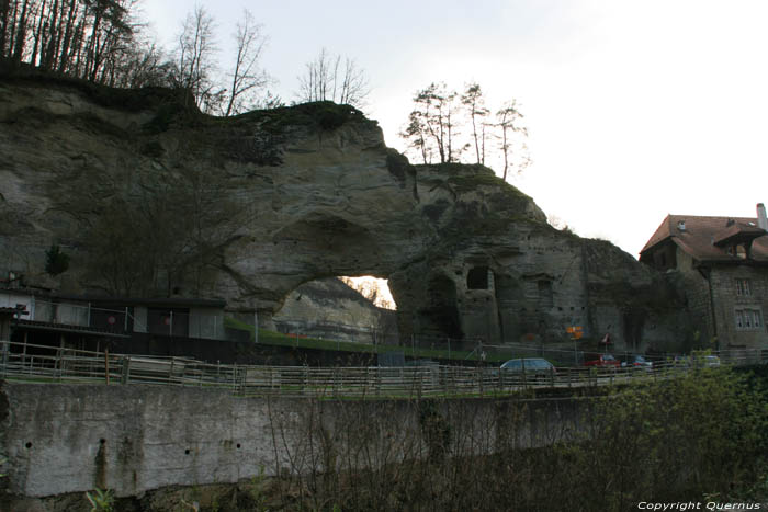 Hole through rocks Fribourg / Switzerland 