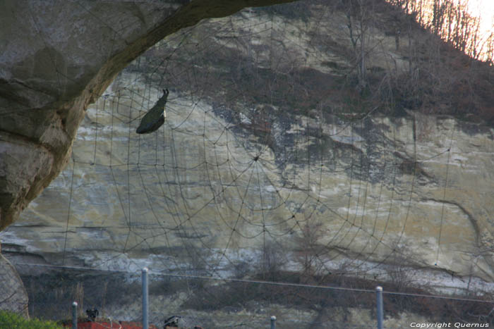 Hole through rocks Fribourg / Switzerland 