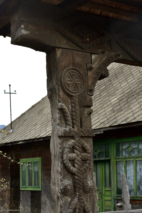 Old farmhouse with typical entrance gate for Maramures Mare / Romania 