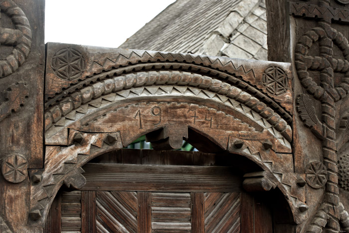 Old farmhouse with typical entrance gate for Maramures Mare / Romania 