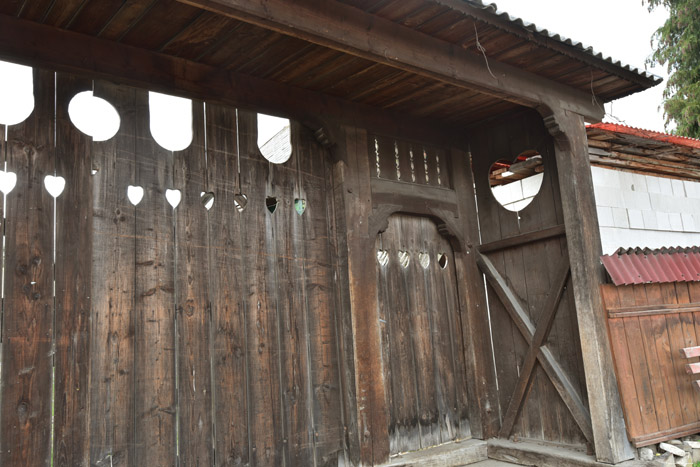 Wooden farm with gate with Hearts Mare / Romania 