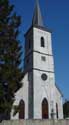 Sint-Nikolaus RAEREN / BELGIË: De westelijke toren bevat bovenaan een boogfries.