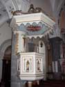 Saint-Nicholas RAEREN / BELGIUM: The church contains a white pulpit that was decorated with gold.