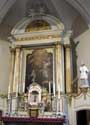 Saint-Nicholas RAEREN / BELGIUM: The main altar in baroque style is flanked by 2 statues of Saint Nicholas. 