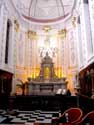 Onze-Lieve-Vrouw ter Finistere (Finisterraekerk) BRUSSEL-STAD / BRUSSEL foto: Het interieur ademt barok uit, zowel het stucwerk als het houtsnijwerk.