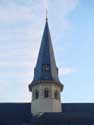 Sint-Martinuskerk BEVEREN foto: De romaanse vieringtoren werd in 1225 verhoogd met een verdieping. Hij bevat nog steeds prachtige romaanse openingen en een boogfries.