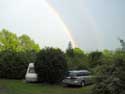 Regenboog op camping le Roptai (Ave-et-Auffe) ROCHEFORT / BELGI: Och... achter de struik mijn caravan, en voor de struik mijn auto (een Subaru Legacy op LPG... gekocht in occasie)